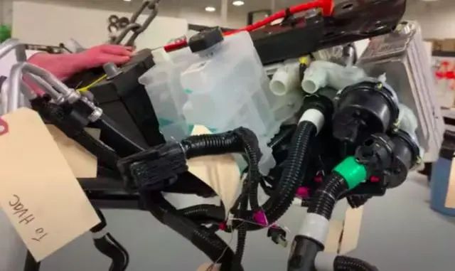 Model Y thermal management assembly compact layout