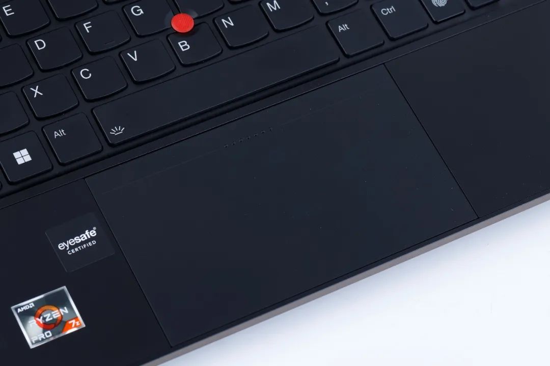 classic TrackPoint and an integrated force-sensing haptic touchpad