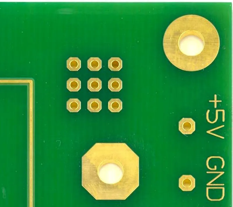 Holes, pads and soldermask regions on a bare board; physical features require corresponding explicit manufacturing instructions.