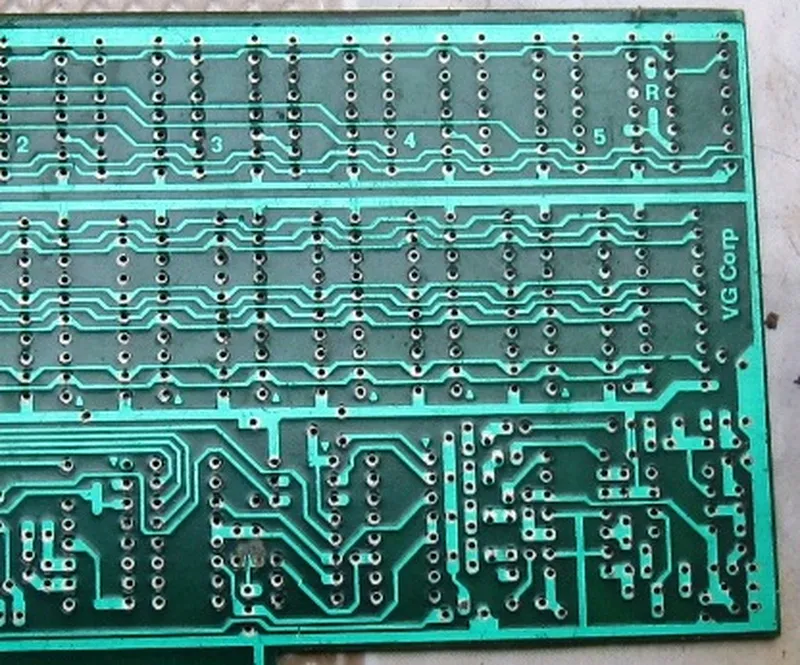 Backside traces and solder features; the surface view cannot reveal continuity of internal reference planes