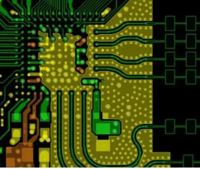 Guarded analog trace with ground stitching vias