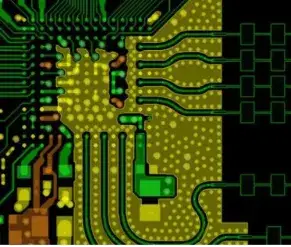 Guarded analog trace with ground stitching vias