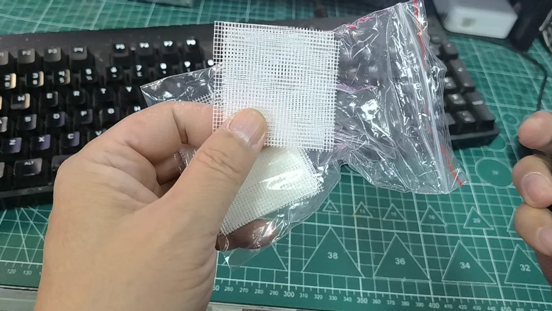 Glass fiber mesh used as a spacer under the PCB during etching