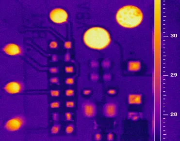 Macro lens view reveals PCB traces and fine features in thermal imaging