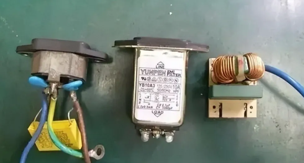 AC inlet with integrated EMI filter module