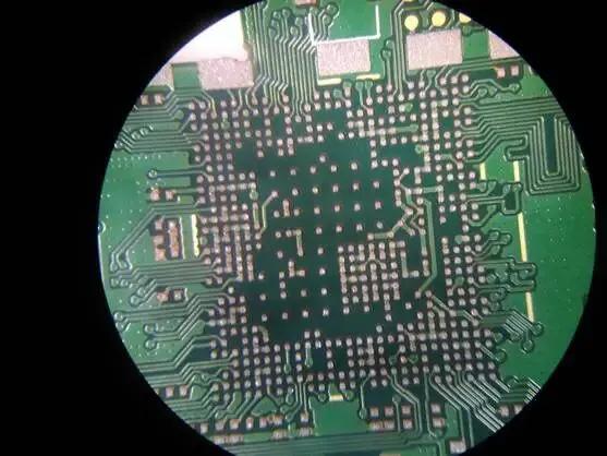 Post-print solder paste deposits using 0.25 mm rounded-square apertures (photo 2)