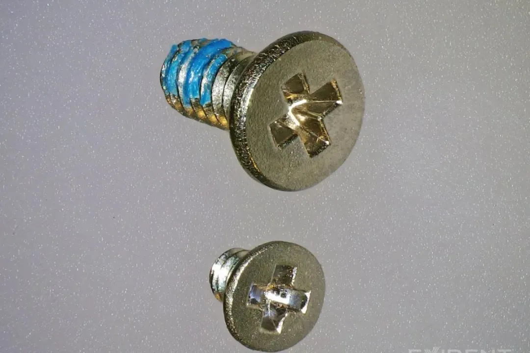 iPhone 15 vs iPhone 14 camera screw comparison iFixit