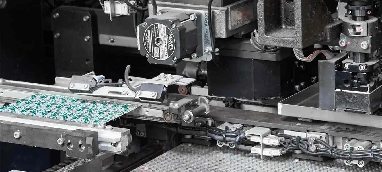 SMT feeder loading standard components for Class 2 PCB assembly