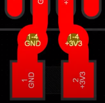 Close-up of a PCB prototype showing incorrect trace spacing