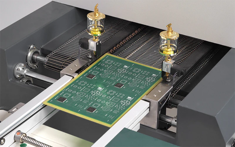 PCB undergoing reflow soldering in a controlled oven