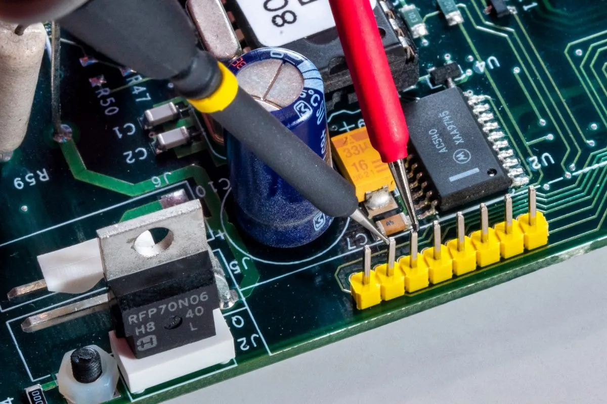 Multimeter probing PCB traces