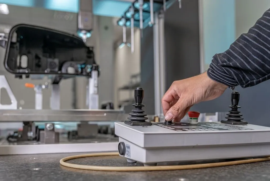 CMM probing a multi-bend sheet metal chassis