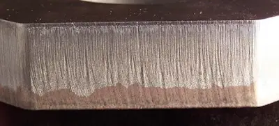 Close-up of laser cut edge quality on 2mm cold-rolled steel