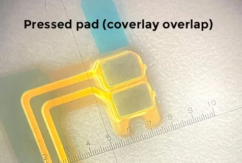 Dimensioned pad and coverlay opening showing typical compensation