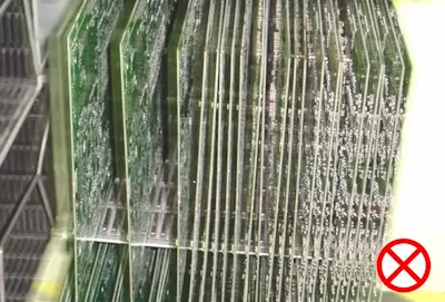 Example of PCB warp resulting from vertical racking