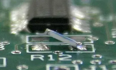 Chip component tombstoned after uneven reflow