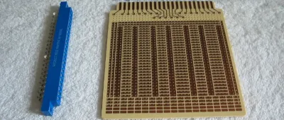 Gold-finger edge connector with inner-layer copper pulled back from the board edge