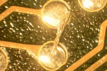 Close-up of solder balls on PCB after reflow