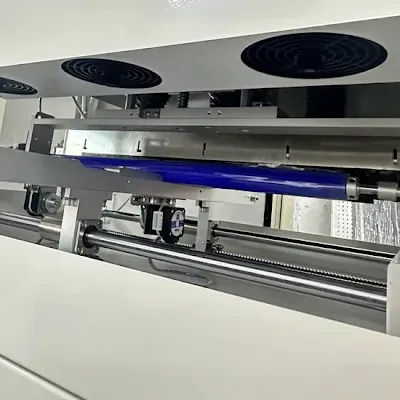 Automated cleaning machine processing PCBs in a production line