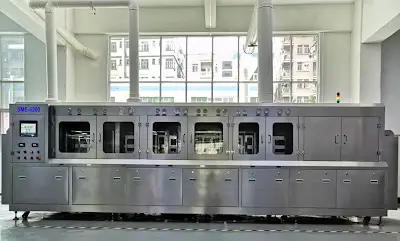 Inline PCB cleaning system in a manufacturing facility