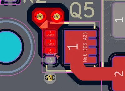 Detailed view of thermal pad connected to copper pour under a power MOSFET