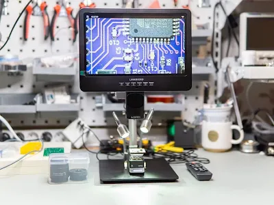 Engineer performing rework on a PCB with fine-pitch components