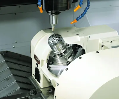 Side-by-side view of a 3-axis vertical machining center and a 5-axis simultaneous mill showing tool, spindle, and rotary table positions during a typical contouring cycle.