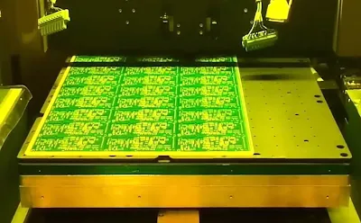 Green solder mask being applied to a PCB during fabrication