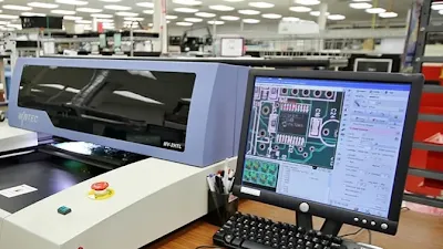 Automated optical inspection system scanning a PCB for solder defects