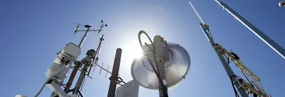 Outdoor base station with edge computing hardware exposed to environmental conditions