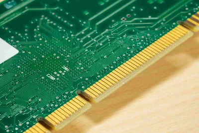 Gold fingers, often called edge connectors, are specialized gold-plated contact pads located along the peripheral edge of a printed circuit board.