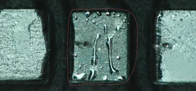 Example of incomplete solder coverage due to poor wetting on a pad