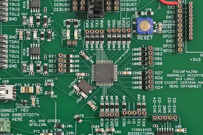 PCB layout showing organized SMT component placement with fiducial marks