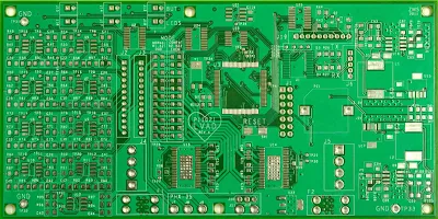 Top view of a 4-layer PCB with components grouped for efficient routing