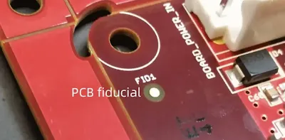lose-up of fiducial markers on a high-density PCB