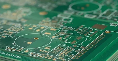 Close up view of a green solder mask on a printed circuit board