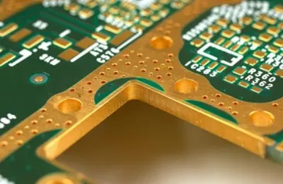 Close-up of a PCB with metallic edge plating for grounding