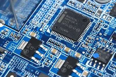 Circuit board with blue solder mask showing contrast with copper traces
