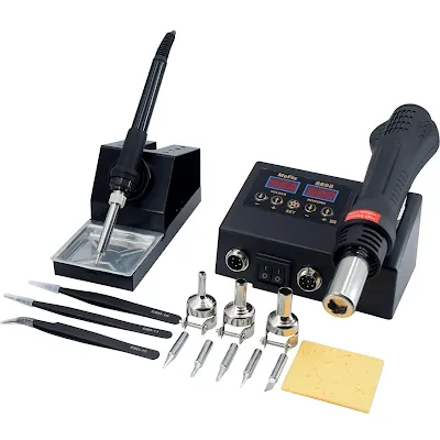 Clean hobbyist bench with soldering station, tweezers, flux pen, and hot air tool