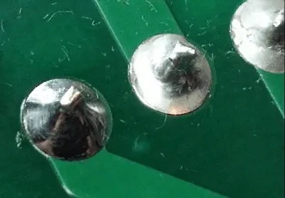 Example of a well-formed, shiny solder joint on a through-hole component